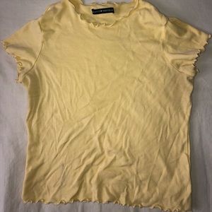 SOLD!!!!! Light yellow brandy melville ruffle tee